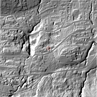 Shaded relief map of the ground around LS299QL, computed from Environment Agency LiDAR. The ground here sits at about 144 m above sea level and falls 131 m across the surrounding 800 m. Surface water reaching this point runs off ground lying to the south-south-west, 30.3 m higher.