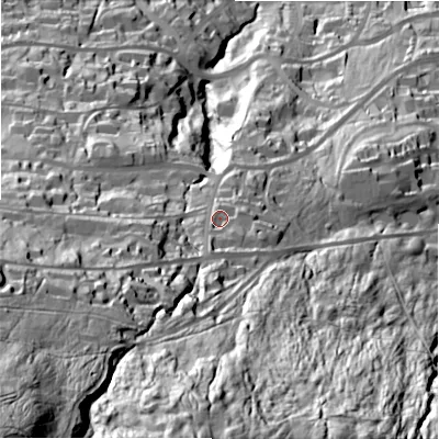 Shaded relief map of the ground around LS299TE, computed from Environment Agency LiDAR. The ground here sits at about 167 m above sea level and falls 160 m across the surrounding 800 m. Surface water reaching this point runs off ground lying to the south, 13.2 m higher.