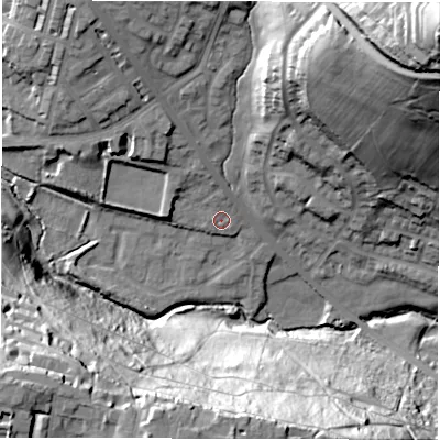 Shaded relief map of the ground around LS62FJ, computed from Environment Agency LiDAR. The ground here sits at about 52 m above sea level and falls 66 m across the surrounding 800 m. Surface water reaching this point runs off ground lying to the north, 2.2 m higher.