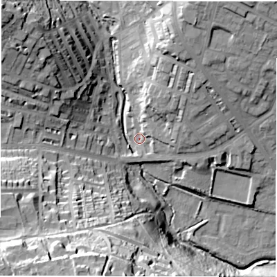 Shaded relief map of the ground around LS64AQ, computed from Environment Agency LiDAR. The ground here sits at about 53 m above sea level and falls 54 m across the surrounding 800 m. Surface water reaching this point runs off ground lying to the south-south-west, 48.1 m higher.