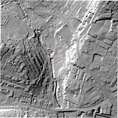 Shaded relief map of the ground around LS64HN, computed from Environment Agency LiDAR. The ground here sits at about 57 m above sea level and falls 42 m across the surrounding 800 m. Surface water reaching this point runs off ground lying to the east-north-east, 15.2 m higher.