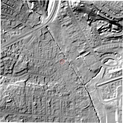 Shaded relief map of the ground around LS83BU, computed from Environment Agency LiDAR. The ground here sits at about 56 m above sea level and falls 42 m across the surrounding 800 m. Surface water reaching this point runs off ground lying to the west, 11.2 m higher.