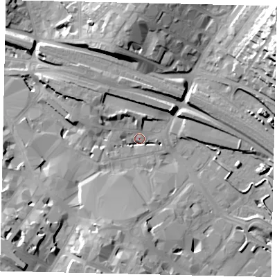 Shaded relief map of the ground around LU12NQ, computed from Environment Agency LiDAR. The ground here sits at about 105 m above sea level and falls 35 m across the surrounding 800 m. Surface water reaching this point runs off ground lying to the south-west, 19.6 m higher.