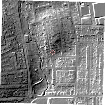 Shaded relief map of the ground around LU27DJ, computed from Environment Agency LiDAR. The ground here sits at about 112 m above sea level and falls 23 m across the surrounding 800 m. Surface water reaching this point runs off ground lying to the north, 6.8 m higher.
