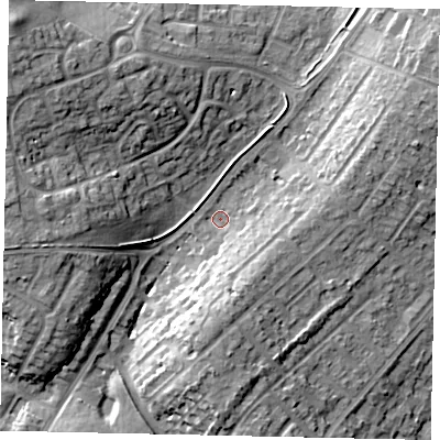 Shaded relief map of the ground around LU32BX, computed from Environment Agency LiDAR. The ground here sits at about 115 m above sea level and falls 15 m across the surrounding 800 m. Surface water reaching this point runs off ground lying to the east-north-east, 10.9 m higher.