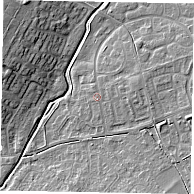 Shaded relief map of the ground around LU73XZ, computed from Environment Agency LiDAR. The ground here sits at about 87 m above sea level and falls 12 m across the surrounding 800 m. Surface water reaching this point runs off ground lying to the east-north-east, 0.8 m higher.