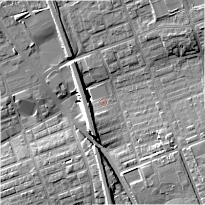 Shaded relief map of the ground around M124NZ, computed from Environment Agency LiDAR. The ground here sits at about 50 m above sea level and falls 13 m across the surrounding 800 m. Surface water reaching this point runs off ground lying to the west-south-west, 6.9 m higher.