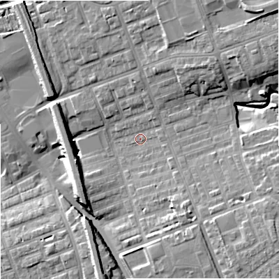 Shaded relief map of the ground around M124PD, computed from Environment Agency LiDAR. The ground here sits at about 51 m above sea level and falls 16 m across the surrounding 800 m. Surface water reaching this point runs off ground lying to the north-east, 14.9 m higher.