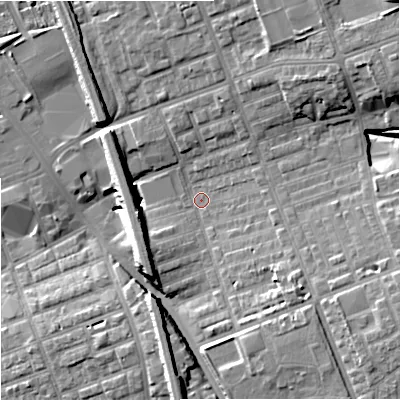 Shaded relief map of the ground around M124WZ, computed from Environment Agency LiDAR. The ground here sits at about 50 m above sea level and falls 15 m across the surrounding 800 m. Surface water reaching this point runs off ground lying to the west-south-west, 6.7 m higher.