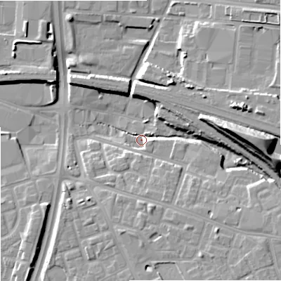 Shaded relief map of the ground around M125DL, computed from Environment Agency LiDAR. The ground here sits at about 51 m above sea level and falls 22 m across the surrounding 800 m. Surface water reaching this point runs off ground lying to the east-south-east, 9.7 m higher.