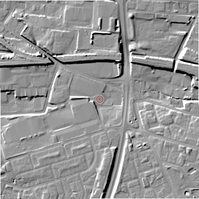 Shaded relief map of the ground around M125DX, computed from Environment Agency LiDAR. The ground here sits at about 52 m above sea level and falls 12 m across the surrounding 800 m. Surface water reaching this point runs off ground lying to the east-north-east, 9.6 m higher.