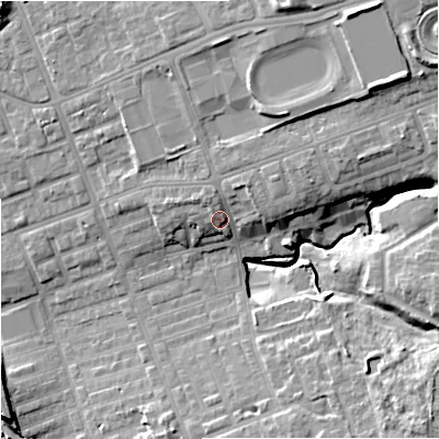 Shaded relief map of the ground around M125GH, computed from Environment Agency LiDAR. The ground here sits at about 56 m above sea level and falls 16 m across the surrounding 800 m. Surface water reaching this point runs off ground lying to the east-north-east, 5.4 m higher.