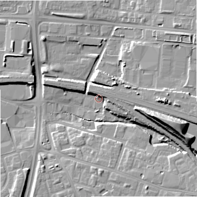 Shaded relief map of the ground around M125PG, computed from Environment Agency LiDAR. The ground here sits at about 54 m above sea level and falls 22 m across the surrounding 800 m. Surface water reaching this point runs off ground lying to the east, 7.1 m higher.