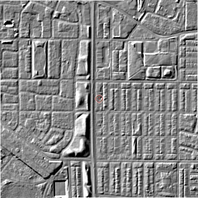 Shaded relief map of the ground around M144RB, computed from Environment Agency LiDAR. The ground here sits at about 32 m above sea level and falls 5 m across the surrounding 800 m. Surface water reaching this point runs off ground lying to the east-north-east, 3.7 m higher.