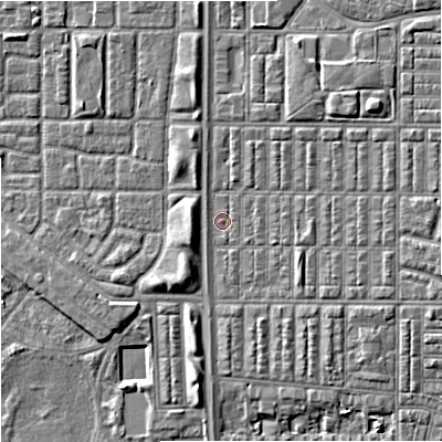 Shaded relief map of the ground around M144RE, computed from Environment Agency LiDAR. The ground here sits at about 32 m above sea level and falls 6 m across the surrounding 800 m. Surface water reaching this point runs off ground lying to the south-south-east, 0.6 m higher.