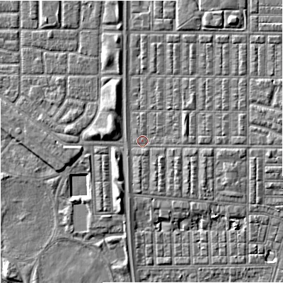 Shaded relief map of the ground around M144RG, computed from Environment Agency LiDAR. The ground here sits at about 32 m above sea level and falls 7 m across the surrounding 800 m. Surface water reaching this point runs off ground lying to the east, 2.4 m higher.