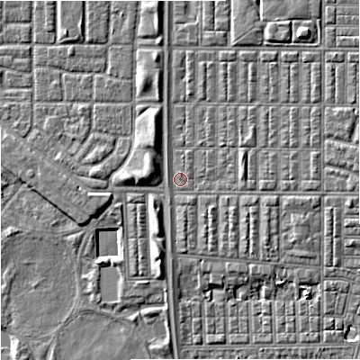 Shaded relief map of the ground around M144RH, computed from Environment Agency LiDAR. The ground here sits at about 32 m above sea level and falls 7 m across the surrounding 800 m. Surface water reaching this point runs off ground lying to the north-east, 3.7 m higher.