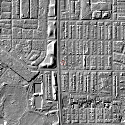 Shaded relief map of the ground around M144RL, computed from Environment Agency LiDAR. The ground here sits at about 32 m above sea level and falls 7 m across the surrounding 800 m. Surface water reaching this point runs off ground lying to the north-north-east, 0.5 m higher.