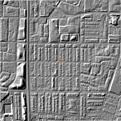 Shaded relief map of the ground around M144RN, computed from Environment Agency LiDAR. The ground here sits at about 33 m above sea level and falls 6 m across the surrounding 800 m. Surface water reaching this point runs off ground lying to the east, 2.3 m higher.