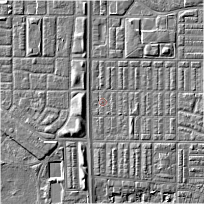 Shaded relief map of the ground around M144RP, computed from Environment Agency LiDAR. The ground here sits at about 32 m above sea level and falls 6 m across the surrounding 800 m. Surface water reaching this point runs off ground lying to the north-east, 3.7 m higher.