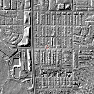 Shaded relief map of the ground around M144RS, computed from Environment Agency LiDAR. The ground here sits at about 33 m above sea level and falls 6 m across the surrounding 800 m. Surface water reaching this point runs off ground lying to the east, 1.7 m higher.