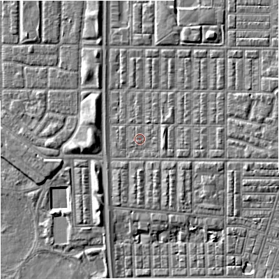 Shaded relief map of the ground around M144RZ, computed from Environment Agency LiDAR. The ground here sits at about 32 m above sea level and falls 6 m across the surrounding 800 m. The ground contributing surface water to this point lies to the east-north-east.