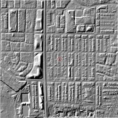 Shaded relief map of the ground around M144SA, computed from Environment Agency LiDAR. The ground here sits at about 33 m above sea level and falls 6 m across the surrounding 800 m. Surface water reaching this point runs off ground lying to the north-east, 3.7 m higher.