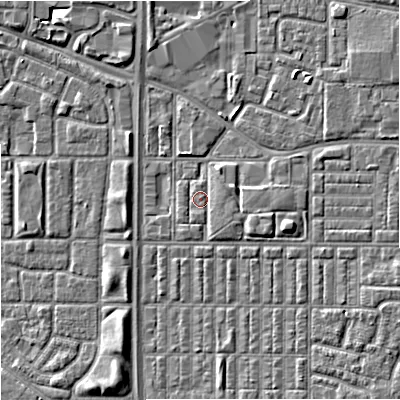 Shaded relief map of the ground around M144SP, computed from Environment Agency LiDAR. The ground here sits at about 33 m above sea level and falls 6 m across the surrounding 800 m. Surface water reaching this point runs off ground lying to the south-west, 0.7 m higher.