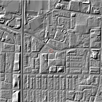 Shaded relief map of the ground around M144ST, computed from Environment Agency LiDAR. The ground here sits at about 33 m above sea level and falls 6 m across the surrounding 800 m. Surface water reaching this point runs off ground lying to the east, 3.3 m higher.