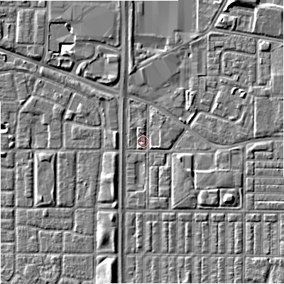 Shaded relief map of the ground around M144SY, computed from Environment Agency LiDAR. The ground here sits at about 32 m above sea level and falls 7 m across the surrounding 800 m. Surface water reaching this point runs off ground lying to the south-east, 2.5 m higher.