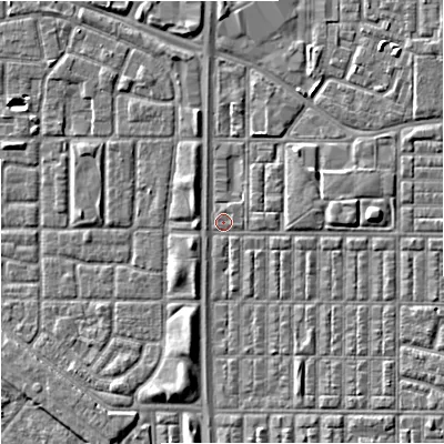 Shaded relief map of the ground around M144TH, computed from Environment Agency LiDAR. The ground here sits at about 33 m above sea level and falls 5 m across the surrounding 800 m. Surface water reaching this point runs off ground lying to the east, 3.5 m higher.