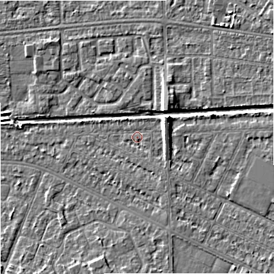Shaded relief map of the ground around M146DF, computed from Environment Agency LiDAR. The ground here sits at about 33 m above sea level and falls 7 m across the surrounding 800 m. Surface water reaching this point runs off ground lying to the east-north-east, 4.4 m higher.
