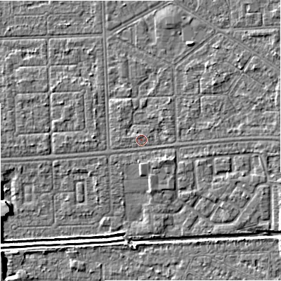 Shaded relief map of the ground around M147DU, computed from Environment Agency LiDAR. The ground here sits at about 33 m above sea level and falls 6 m across the surrounding 800 m. Surface water reaching this point runs off ground lying to the east, 1.3 m higher.