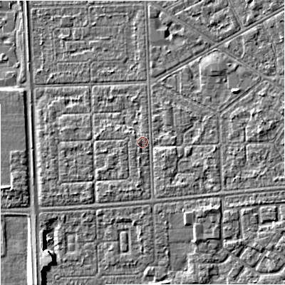 Shaded relief map of the ground around M147DY, computed from Environment Agency LiDAR. The ground here sits at about 33 m above sea level and falls 6 m across the surrounding 800 m. Surface water reaching this point runs off ground lying to the east-south-east, 1.5 m higher.