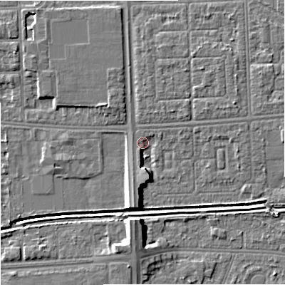 Shaded relief map of the ground around M147FG, computed from Environment Agency LiDAR. The ground here sits at about 32 m above sea level and falls 10 m across the surrounding 800 m. Surface water reaching this point runs off ground lying to the south, 6.1 m higher.