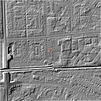 Shaded relief map of the ground around M147FN, computed from Environment Agency LiDAR. The ground here sits at about 33 m above sea level and falls 7 m across the surrounding 800 m. Surface water reaching this point runs off ground lying to the east-north-east, 1.6 m higher.
