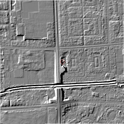 Shaded relief map of the ground around M147FS, computed from Environment Agency LiDAR. The ground here sits at about 32 m above sea level and falls 10 m across the surrounding 800 m. Surface water reaching this point runs off ground lying to the south, 5.7 m higher.