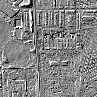 Shaded relief map of the ground around M147JG, computed from Environment Agency LiDAR. The ground here sits at about 32 m above sea level and falls 6 m across the surrounding 800 m. Surface water reaching this point runs off ground lying to the north-east, 4.2 m higher.
