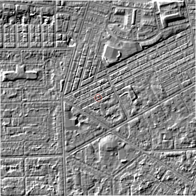 Shaded relief map of the ground around M147QE, computed from Environment Agency LiDAR. The ground here sits at about 33 m above sea level and falls 6 m across the surrounding 800 m. Surface water reaching this point runs off ground lying to the east-north-east, 2.5 m higher.