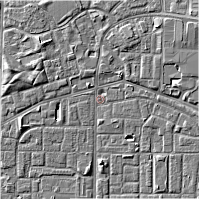 Shaded relief map of the ground around M167BU, computed from Environment Agency LiDAR. The ground here sits at about 32 m above sea level and falls 6 m across the surrounding 800 m. Surface water reaching this point runs off ground lying to the north-east, 5.3 m higher.