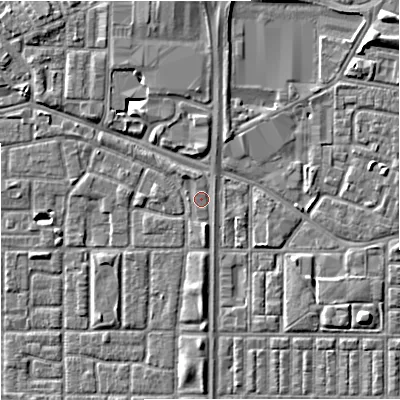 Shaded relief map of the ground around M167BY, computed from Environment Agency LiDAR. The ground here sits at about 33 m above sea level and falls 7 m across the surrounding 800 m. Surface water reaching this point runs off ground lying to the south, 1.3 m higher.