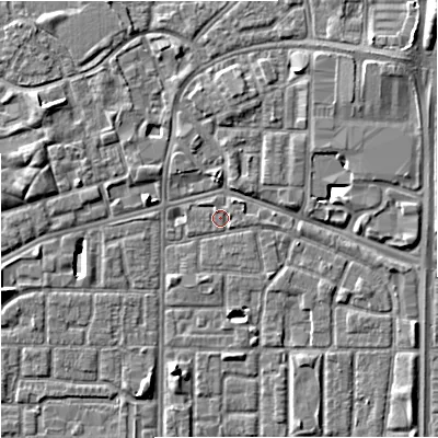 Shaded relief map of the ground around M167DG, computed from Environment Agency LiDAR. The ground here sits at about 32 m above sea level and falls 7 m across the surrounding 800 m. Surface water reaching this point runs off ground lying to the east, 0.7 m higher.