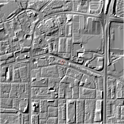 Shaded relief map of the ground around M167DH, computed from Environment Agency LiDAR. The ground here sits at about 32 m above sea level and falls 7 m across the surrounding 800 m. Surface water reaching this point runs off ground lying to the north-east, 6.1 m higher.