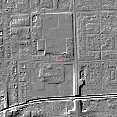 Shaded relief map of the ground around M168GN, computed from Environment Agency LiDAR. The ground here sits at about 31 m above sea level and falls 10 m across the surrounding 800 m. Surface water reaching this point runs off ground lying to the east-north-east, 1.9 m higher.
