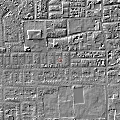 Shaded relief map of the ground around M168JG, computed from Environment Agency LiDAR. The ground here sits at about 29 m above sea level and falls 5 m across the surrounding 800 m. Surface water reaching this point runs off ground lying to the north-east, 0.8 m higher.
