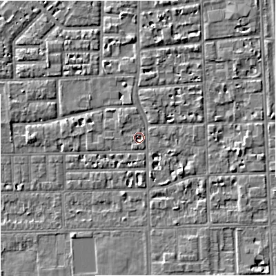 Shaded relief map of the ground around M168JL, computed from Environment Agency LiDAR. The ground here sits at about 29 m above sea level and falls 5 m across the surrounding 800 m. Surface water reaching this point runs off ground lying to the north-north-west, 1.9 m higher.