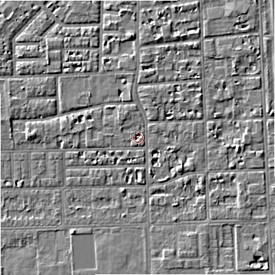 Shaded relief map of the ground around M168JN, computed from Environment Agency LiDAR. The ground here sits at about 29 m above sea level and falls 5 m across the surrounding 800 m. Surface water reaching this point runs off ground lying to the north-north-west, 1.9 m higher.