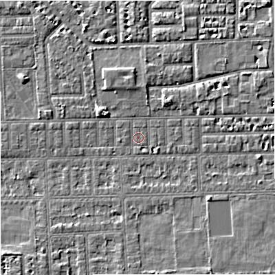 Shaded relief map of the ground around M168JT, computed from Environment Agency LiDAR. The ground here sits at about 29 m above sea level and falls 5 m across the surrounding 800 m. Surface water reaching this point runs off ground lying to the east-north-east, 1.0 m higher.