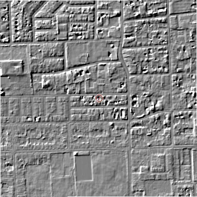 Shaded relief map of the ground around M168LB, computed from Environment Agency LiDAR. The ground here sits at about 29 m above sea level and falls 5 m across the surrounding 800 m. Surface water reaching this point runs off ground lying to the north-north-east, 1.5 m higher.