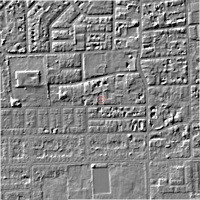 Shaded relief map of the ground around M168LD, computed from Environment Agency LiDAR. The ground here sits at about 29 m above sea level and falls 5 m across the surrounding 800 m. Surface water reaching this point runs off ground lying to the east-north-east, 1.5 m higher.